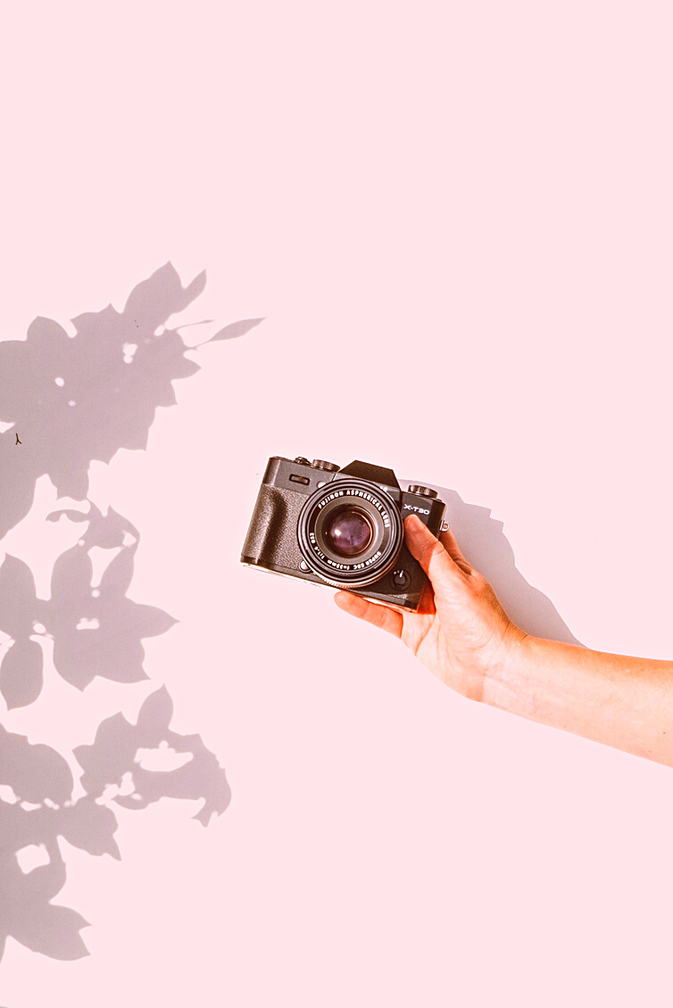 Person Holding Black Dslr Camera